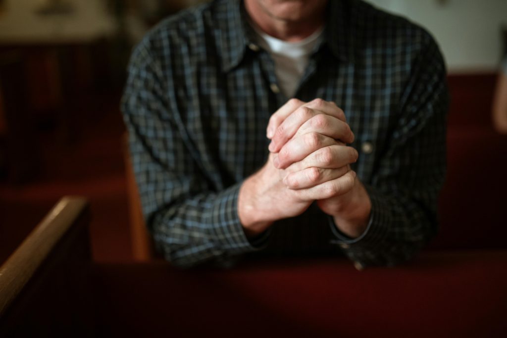 Living Out the Faith: Simple Ways to Be a Missionary Disciple in Your Daily Life 7 man praying catholic church 1