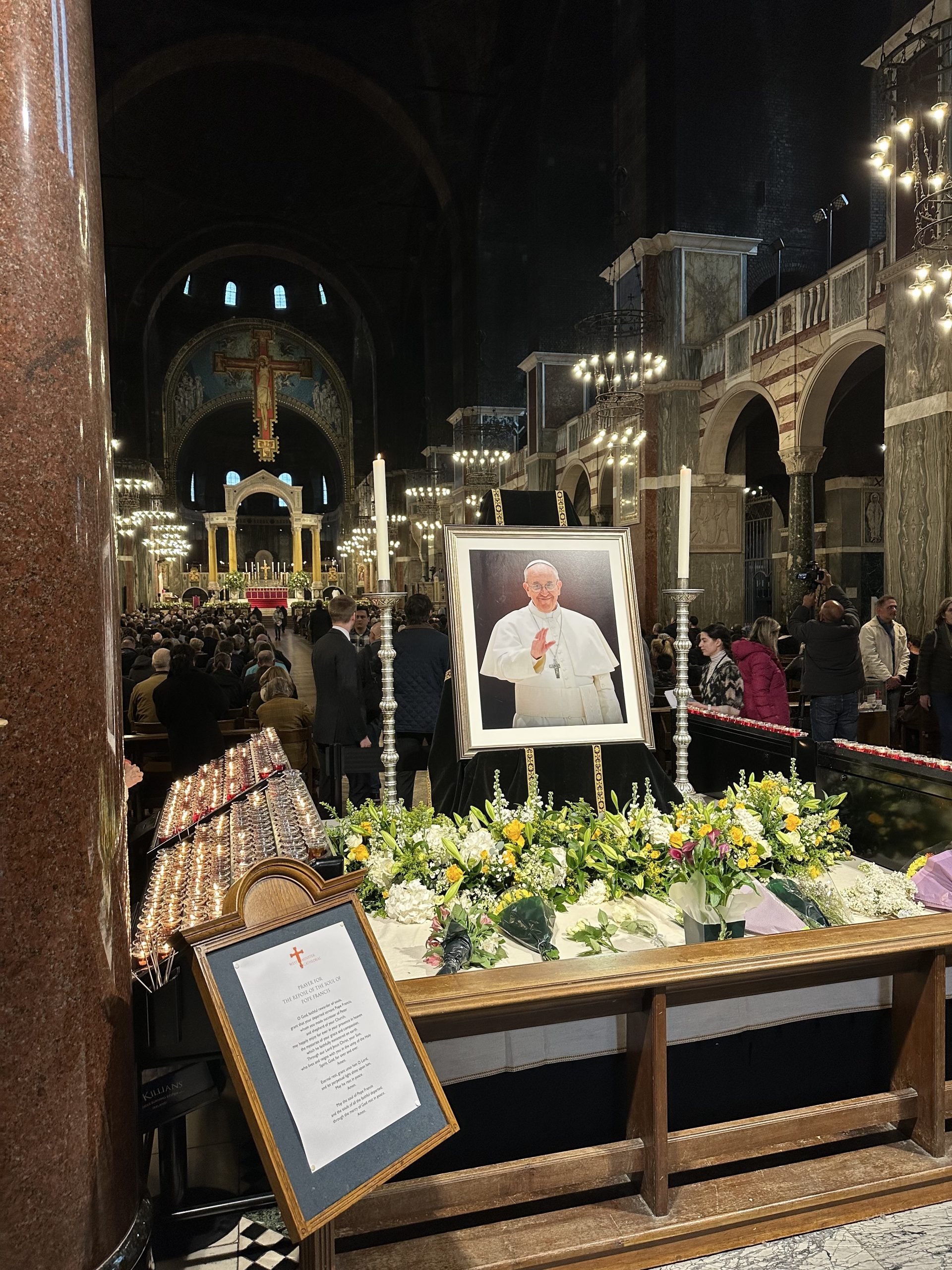 Pope Francis image at requiem mass at Westminster Cathedral, London, featured in Apostle Times Catholic news blog.