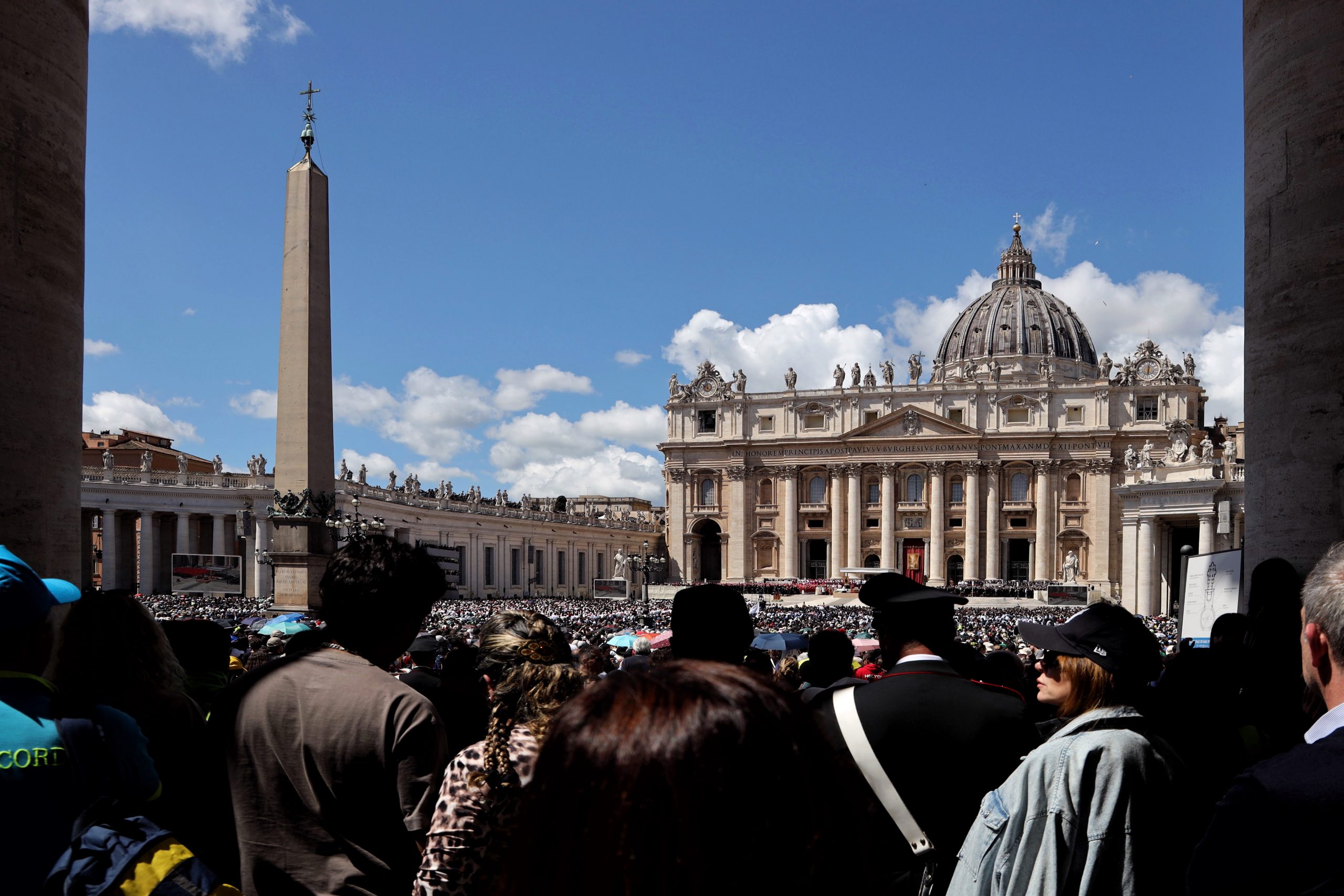 People gather at St. Peter's Square for Pope Francis' funeral mass.